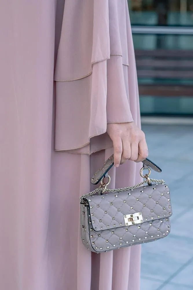 Canddy layered chiffon abaya in blush pink with  belt
