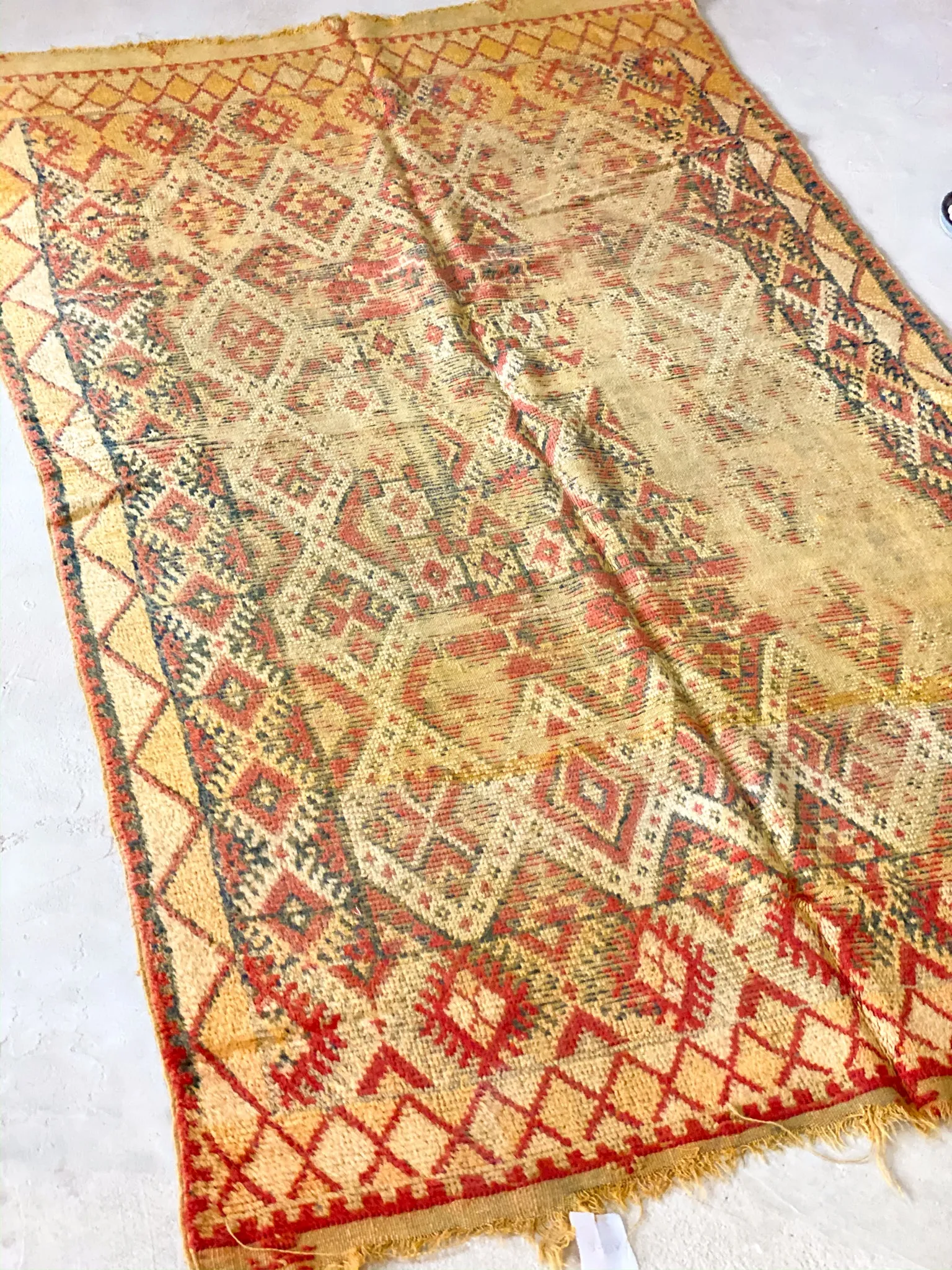 Khadija's Century Old Rug