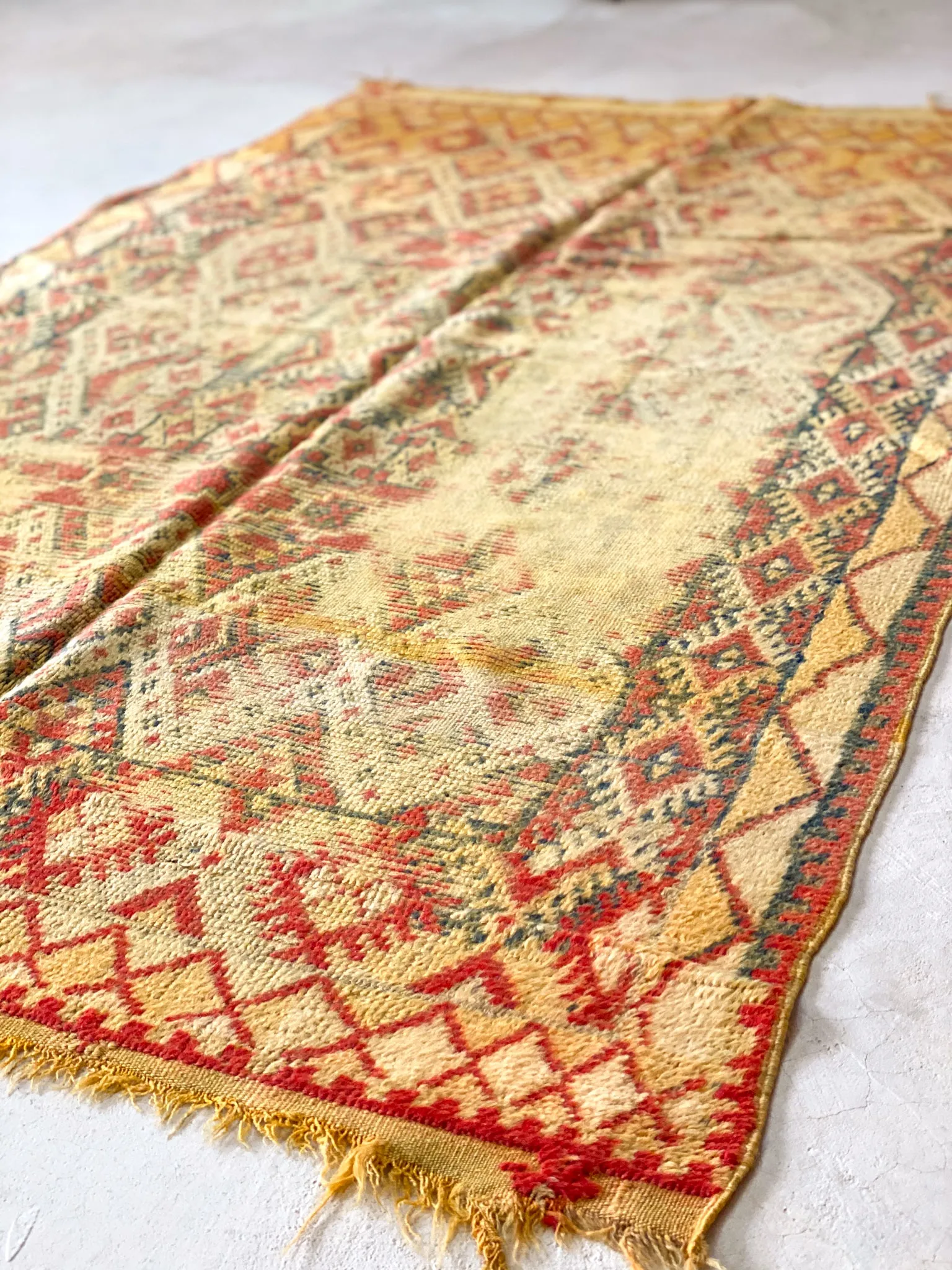 Khadija's Century Old Rug